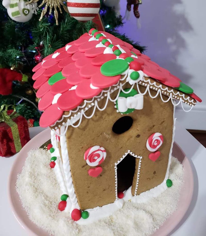 casinha de biscoitos decorada para Natal. Gingerbread house